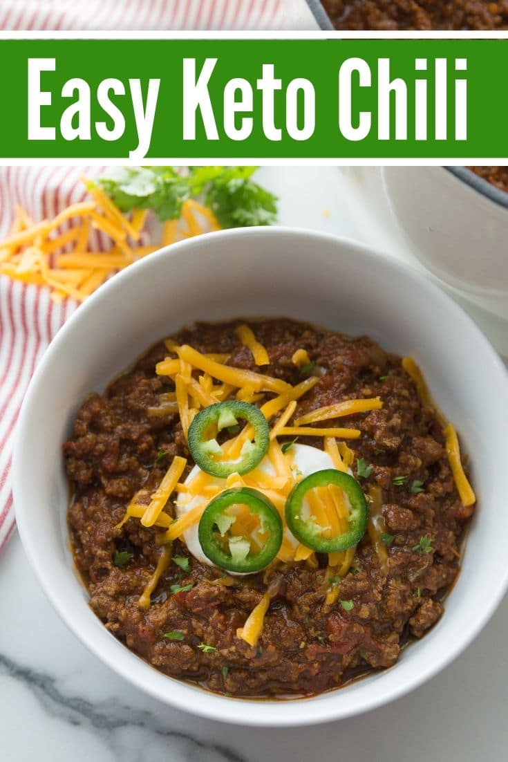 bowl of Keto Chili with jalapeños, cheese, and sour cream on top